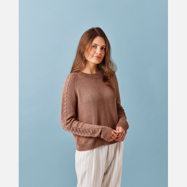 Raglanbluse med m�nster p� �rmerne
